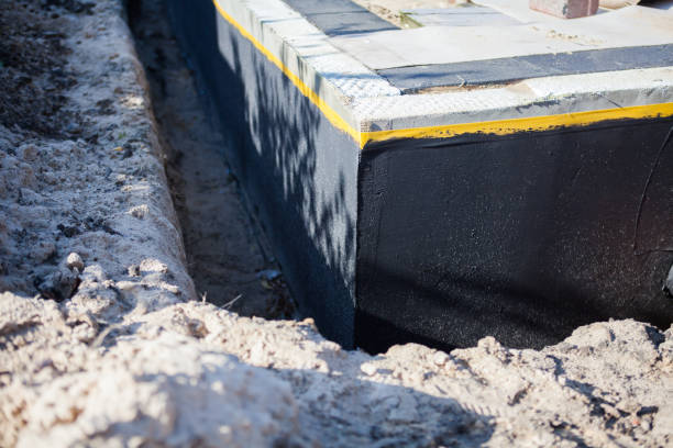 Professional Waterproofing technician working in Clanton, AL